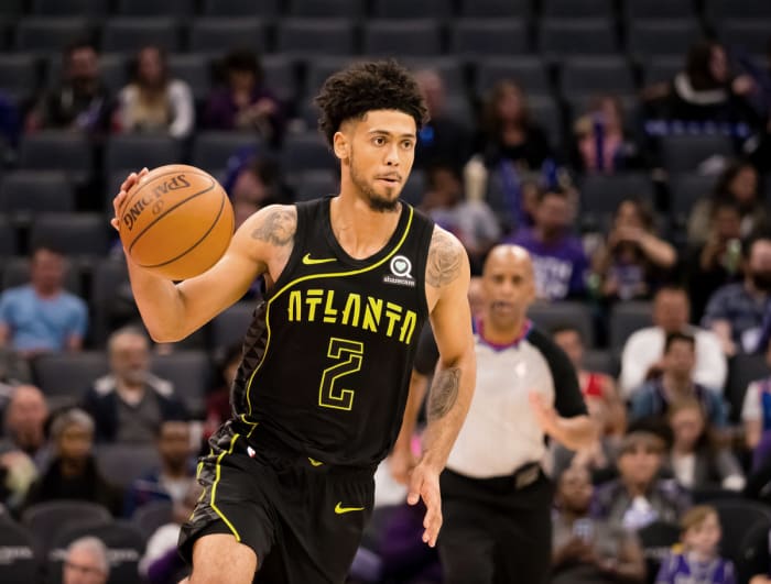 Mar 22, 2018; Sacramento, CA, USA; Atlanta Hawks guard Tyler Dorsey (2) controls the ball against the Sacramento Kings during the third quater at Golden 1 Center.